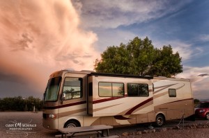 Storm clouds gather behind RV in a Willcox, AZ campsite